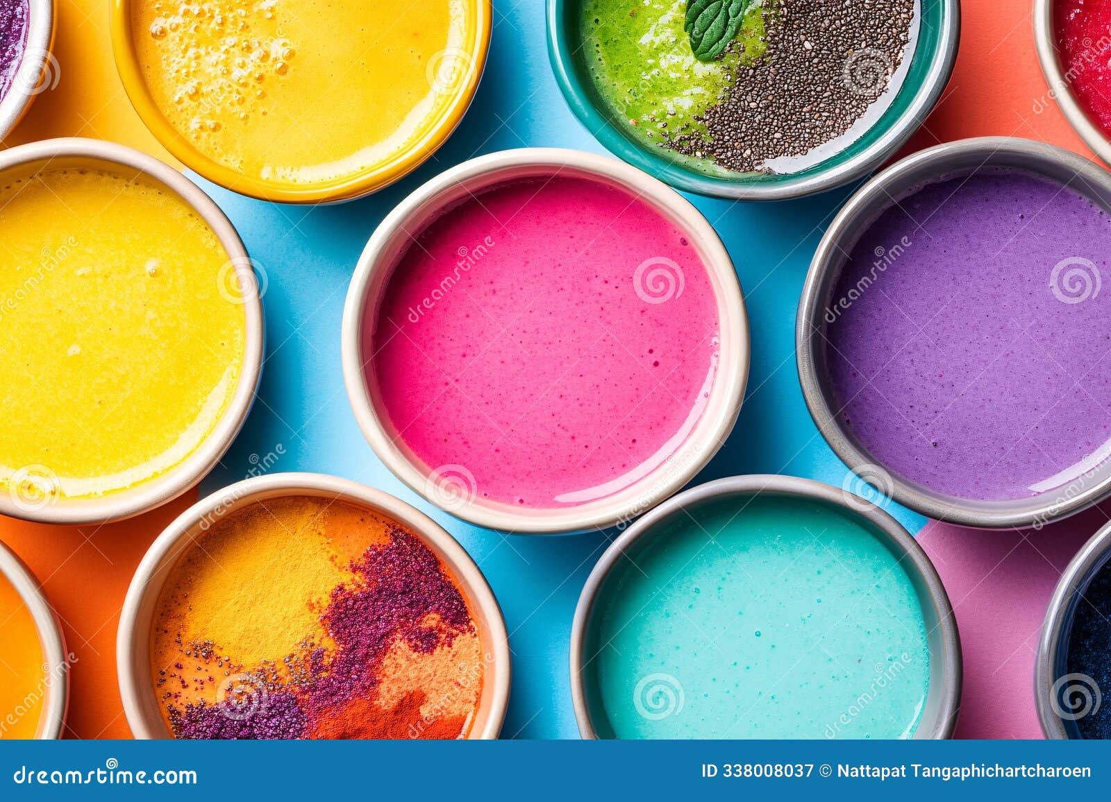a selection of vibrant smoothie bowls, highlighting an array of superfoods for a nutrient-packed breakfast. colorful smoothie