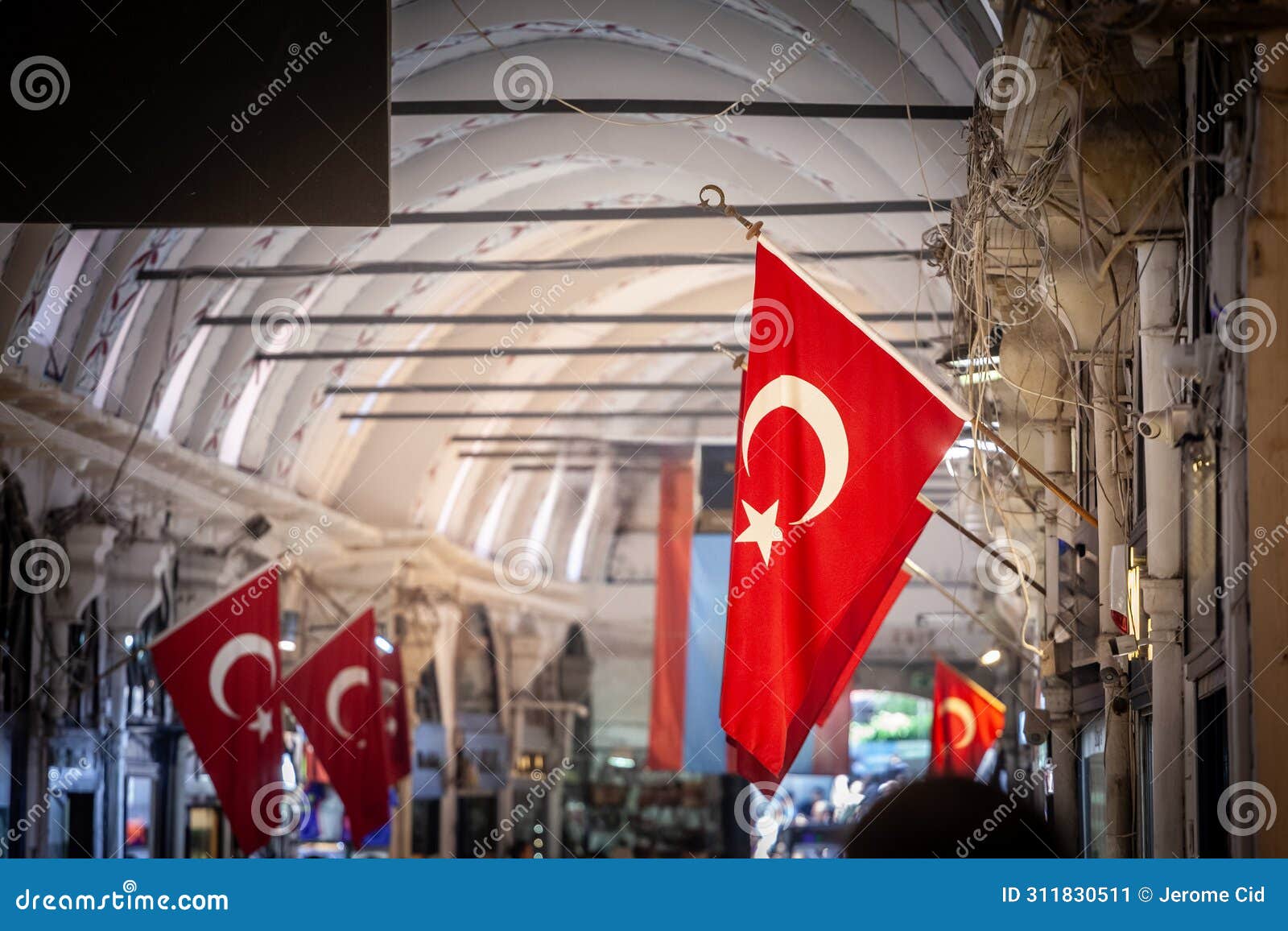 selective blur on turkish flags hung in the grand bazaar. also known as kapalicarsi, it is one of the main landmarks and touristic