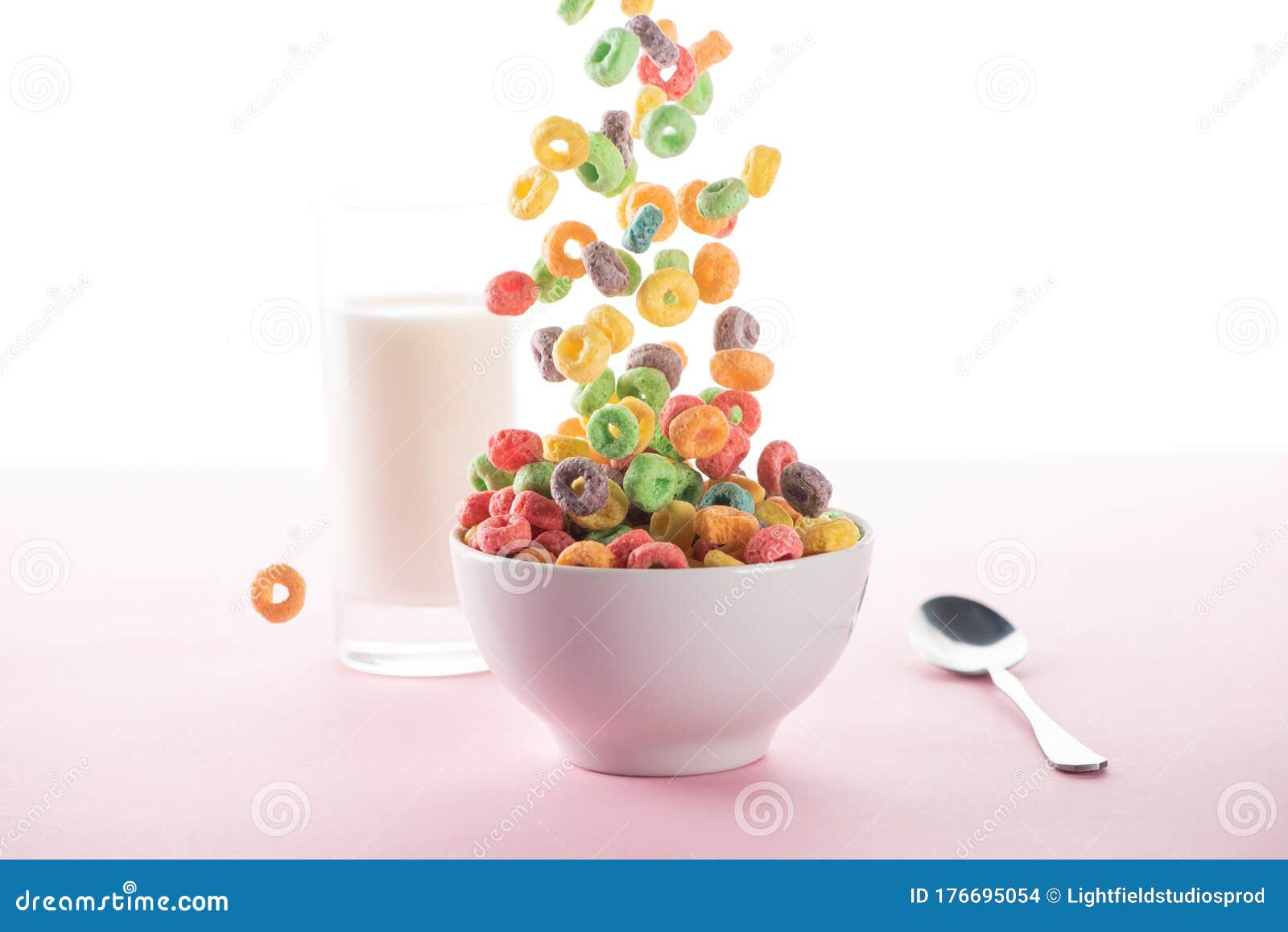 Selective Focus Of Bright Multicolored Breakfast Cereal Falling In Bowl