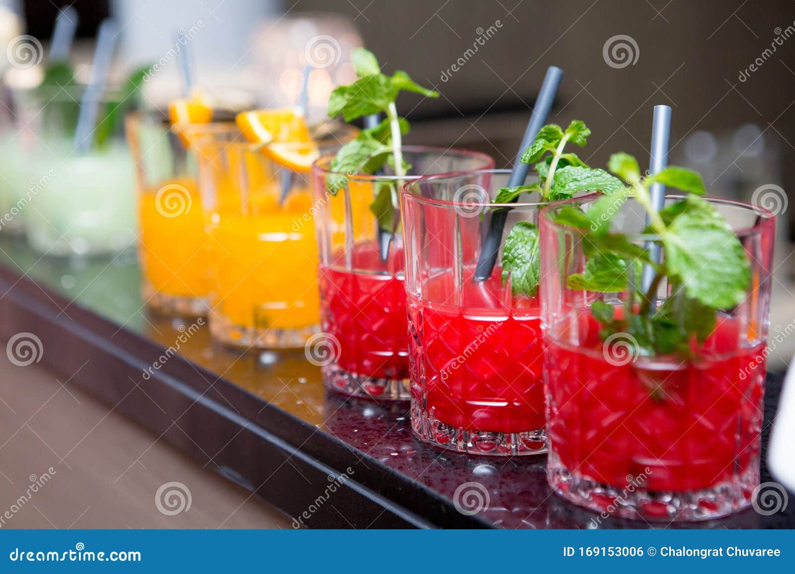 Selective Focus of Colorful Fruit Juice Cocktail in the Bar Stock Photo
