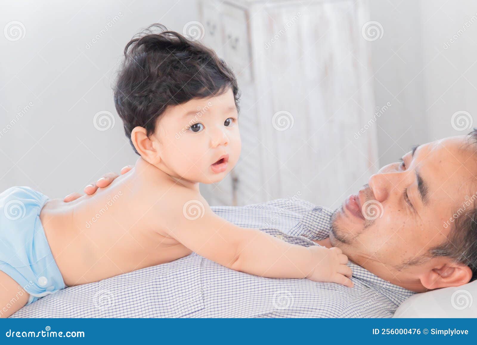 Selective Focus Happy Father Playing with 1-2 Months Newborn Baby with ...