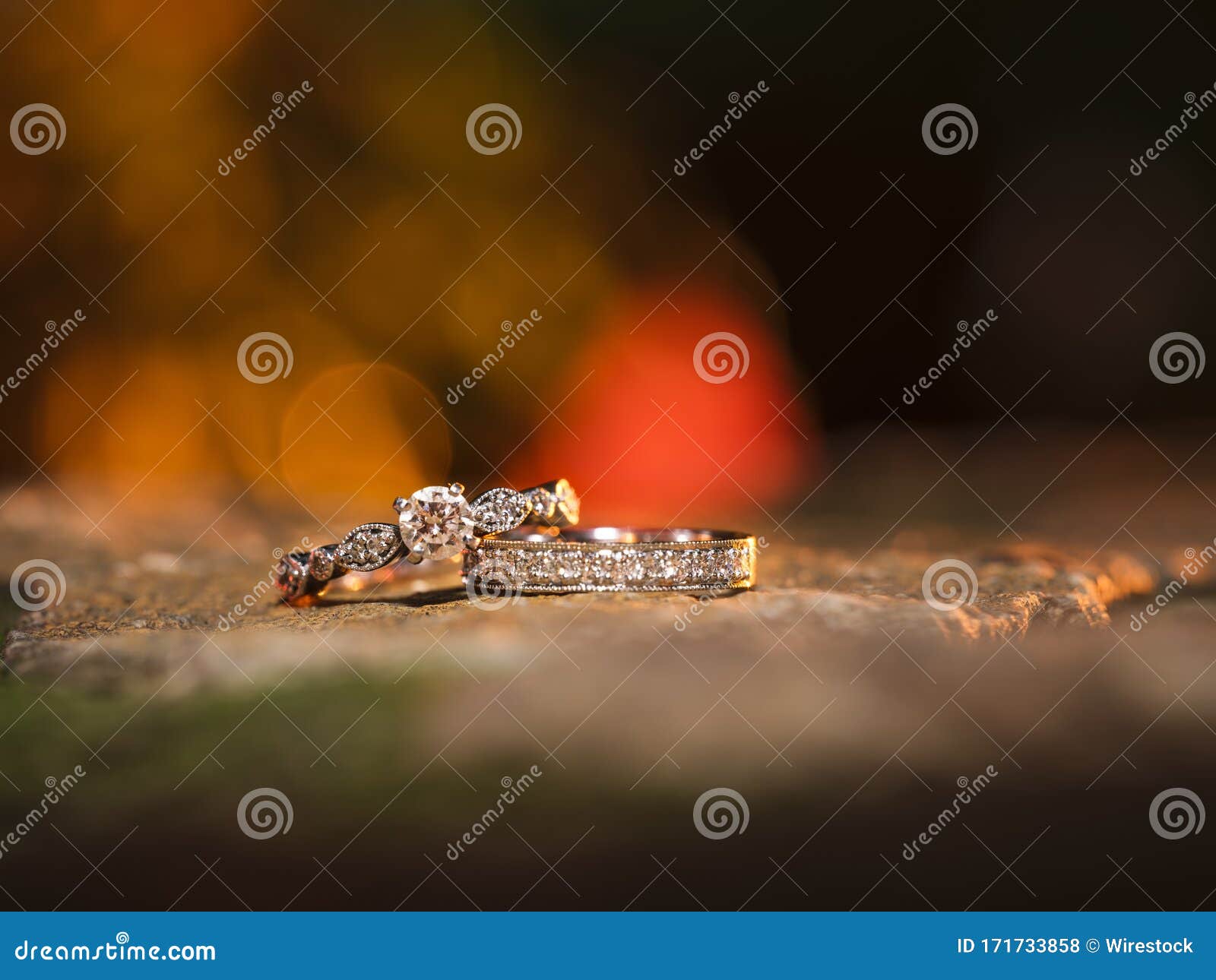 Selective Focus Shot of Elegant Silver Wedding Rings with a Blurred