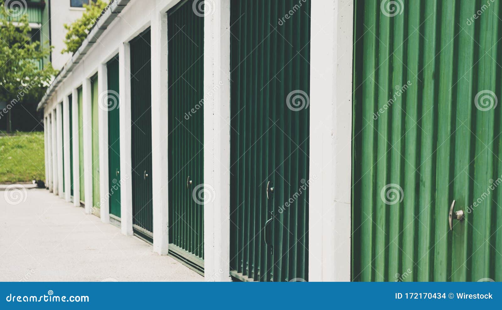 Selective Focus Shot of the Green Steel Doors during Daytime Stock