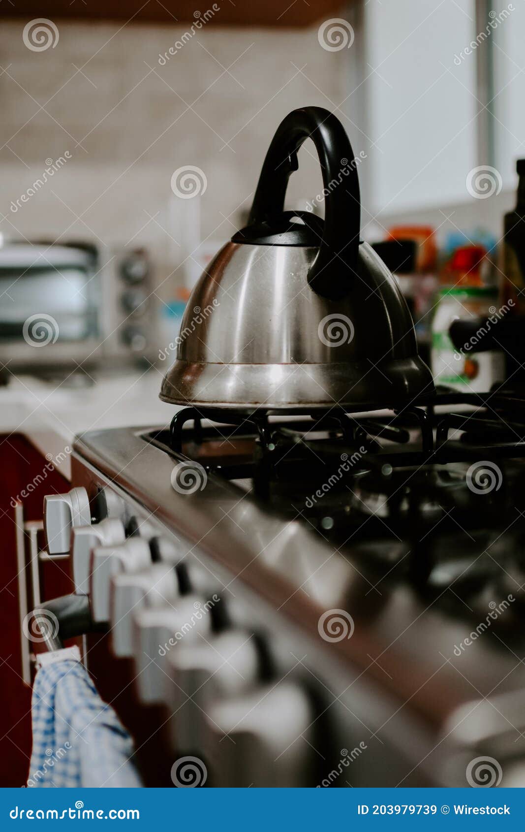 Selective Focus Shot of Tea Kettle with Boiling Water on a Gas Stove