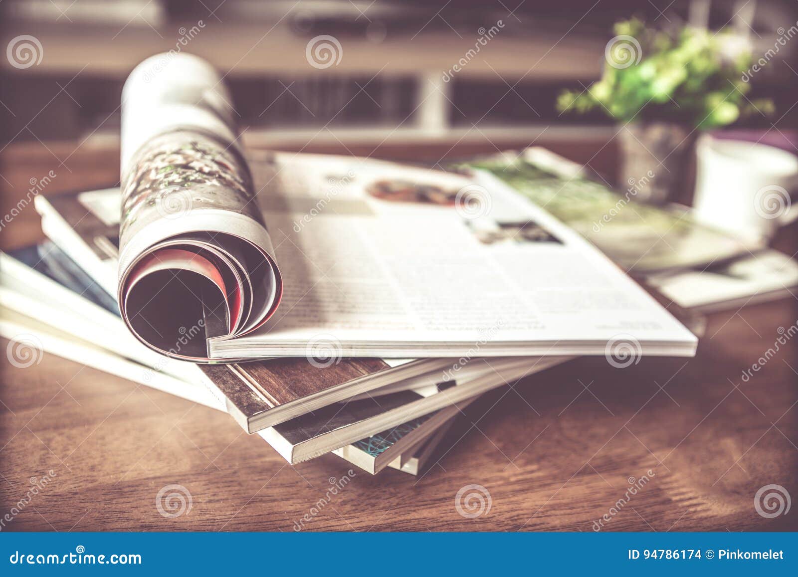 selective focus of stacking magazine place on table in living