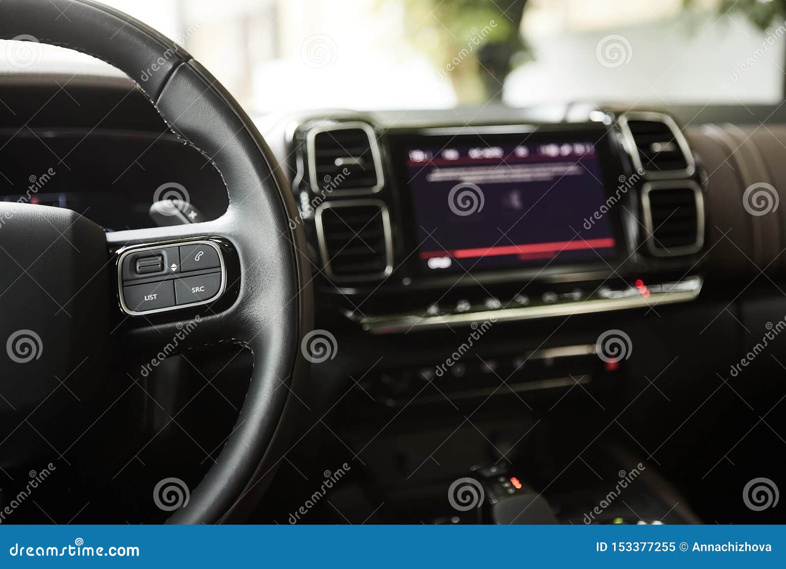 Selective Focus of Steering Wheel Near Gear Shift Handle in Luxury Car