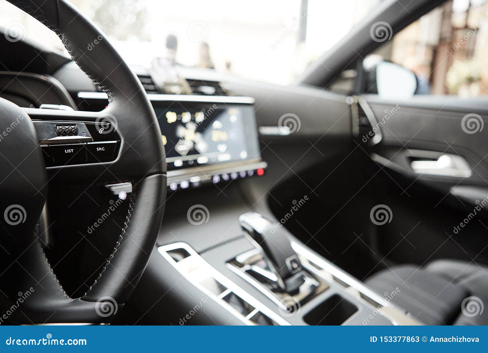 Selective Focus of Steering Wheel Near Gear Shift Handle in Luxury Car
