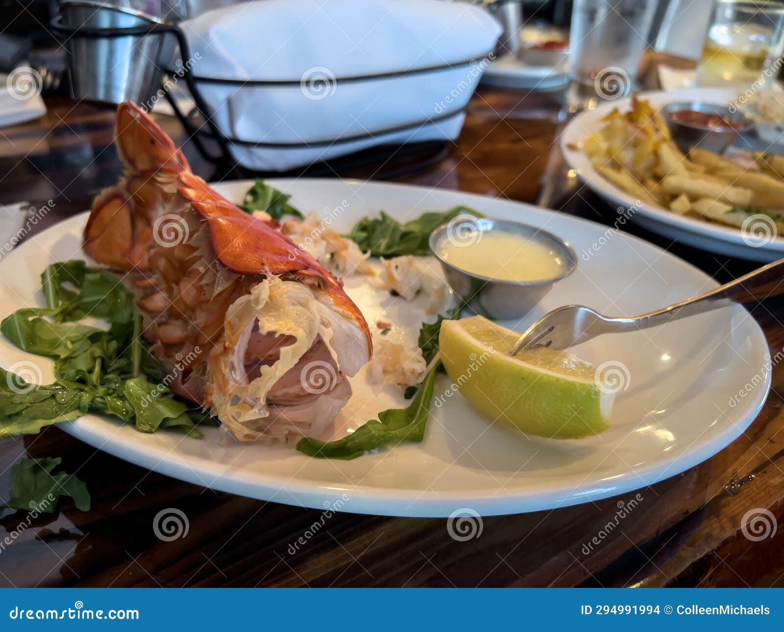 Selective Focus on a Stuffed Lobster Tail on a White Plate in a High End Restaurant Stock Photo