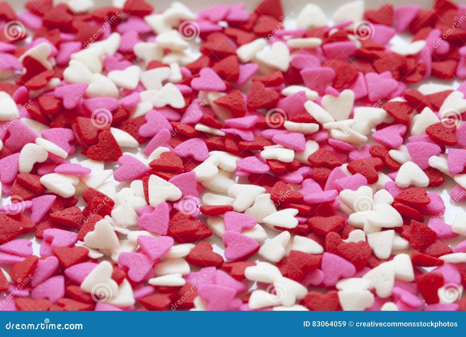 Selective Focus Of White Red And Pink Hearts Sprinkles Picture. Image