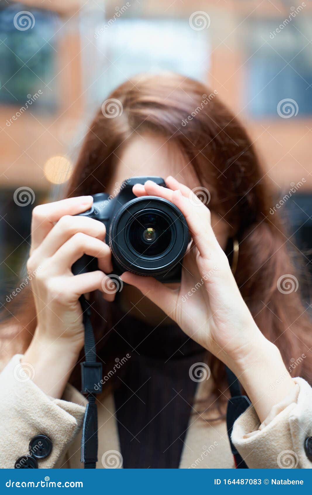 Selective Focuson Lens Beautiful Stylish Fashionable Girl Holds Camera