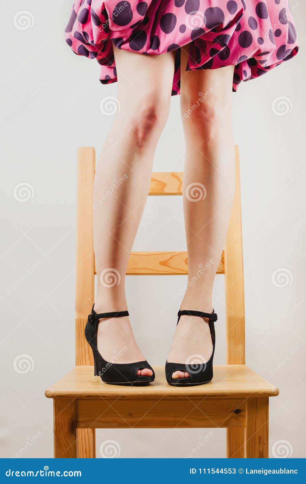 Selective Shot Of White Woman S Legs In Black High Heeled Shoes