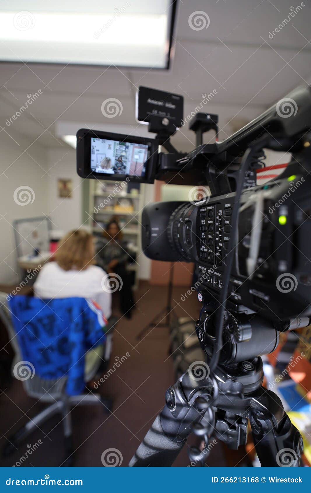 Selective of a Video Camera Filming an Interview Stock Photo Image of