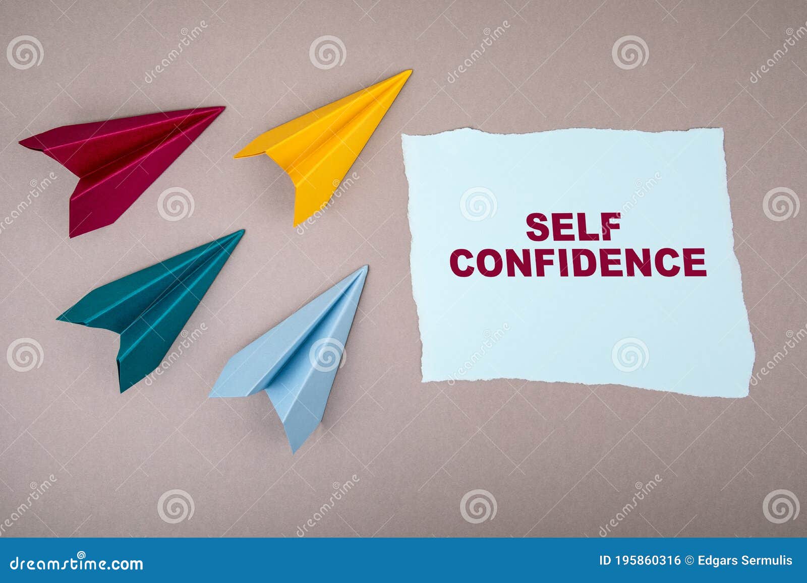 self confidence. text on note sheet, paper planes around,  of gaining goals