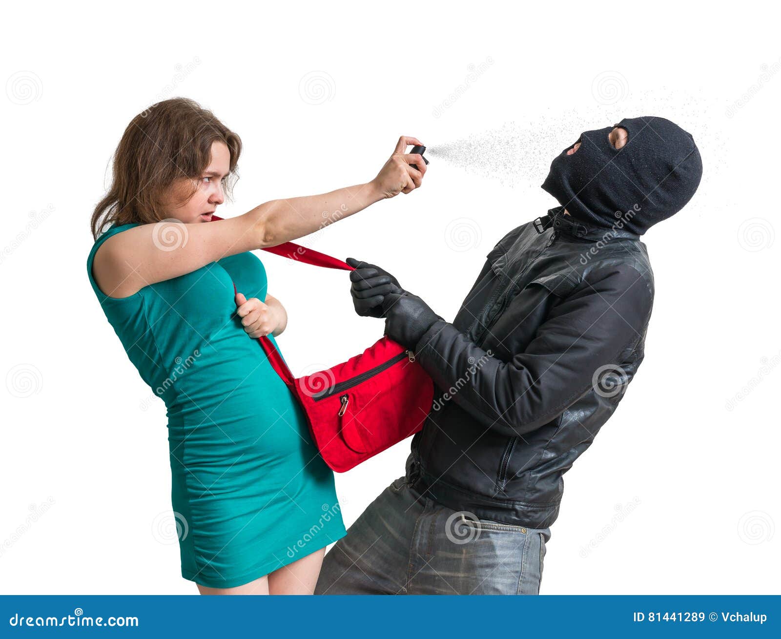 self defense concept. young woman is defending with pepper spray.
