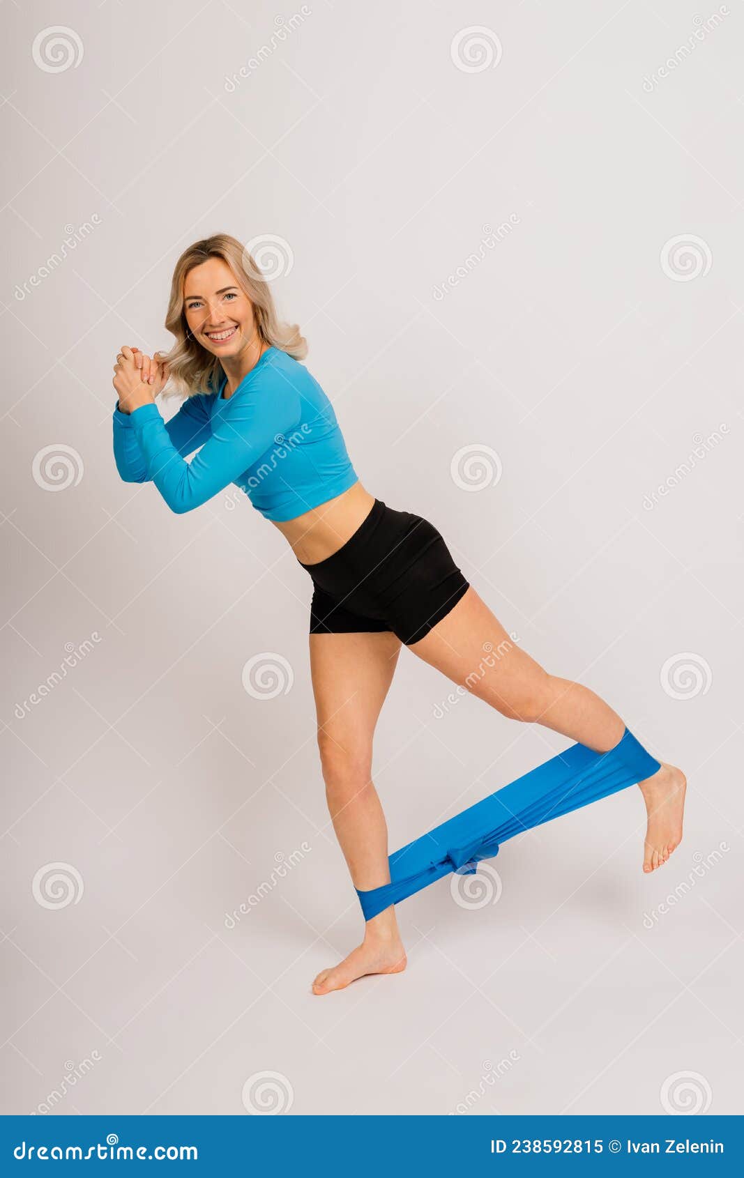 Self Determined Bodybuilder Does Exercises with Rubber Band, Works on