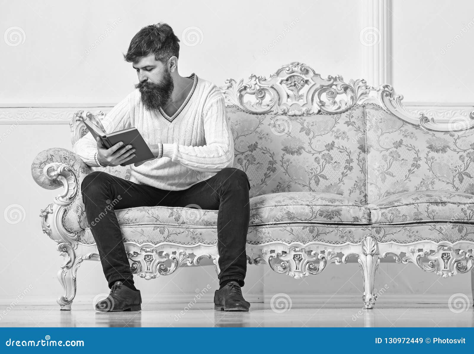 self improvement concept. macho on concentrated face reading book. guy reading book with attention. man with beard and