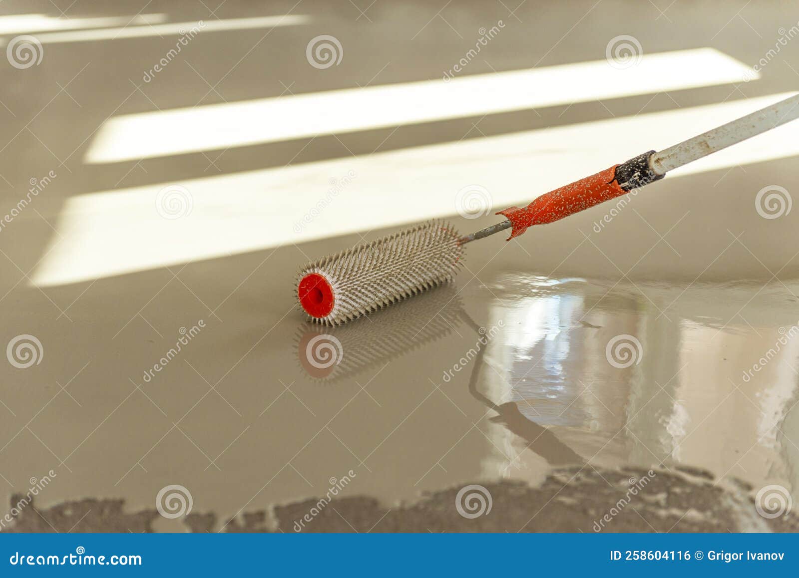 Selfleveling Epoxy. Leveling with a Mixture of Cement Floors Stock