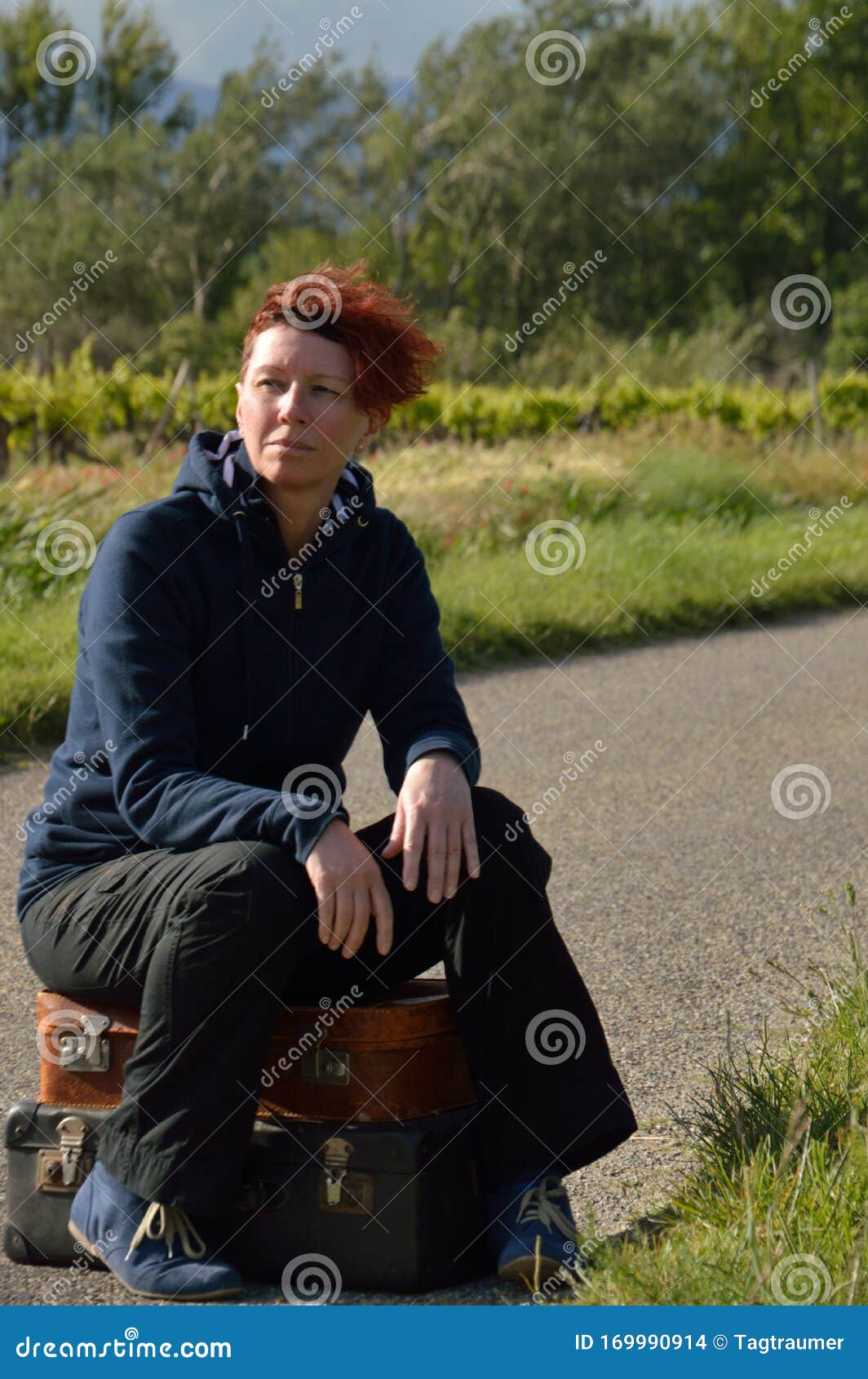 selfconfident red-haired woman on vacation