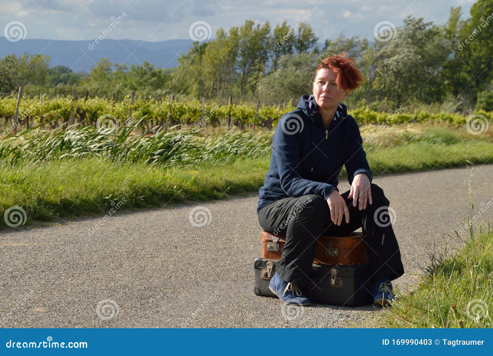 selfconfident red-haired woman on vacation