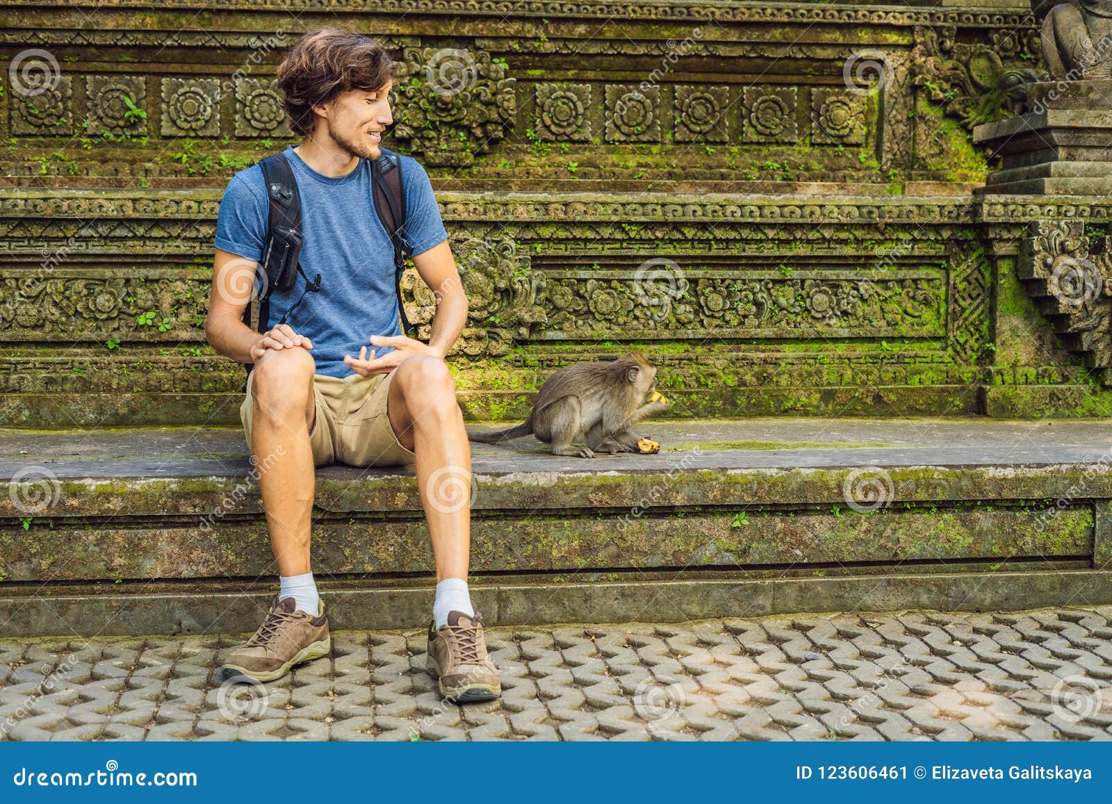 Selfie with Monkeys. Young Man Uses a Selfie To Take a Photo Video Blog with Cute Funny Monkey Stock Image - Image of island, nature: