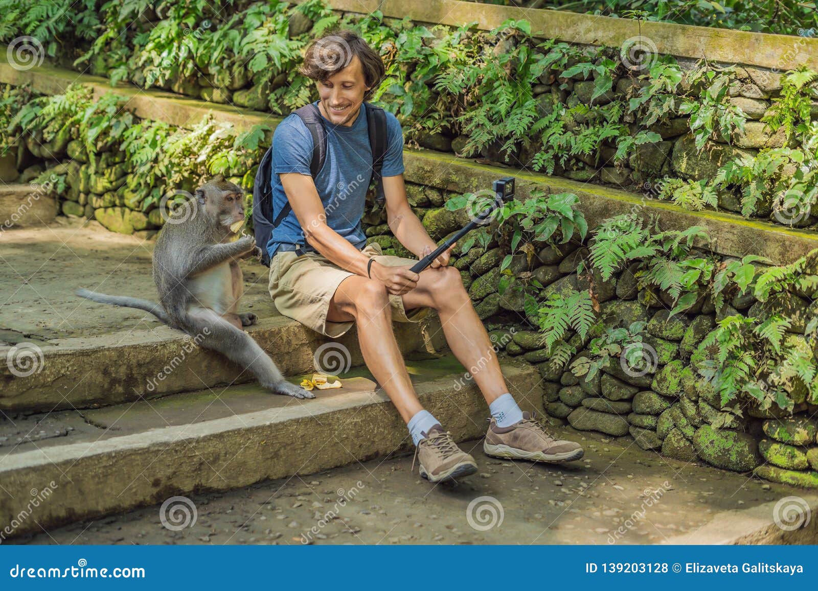 Selfie with Monkeys. Young Man Uses a Selfie Stick To Take a Photo or Video Blog with Cute Funny Monkey Stock Photo - Image of hipster, blog: 139203128 Selfie with Monkeys. Young Man Uses a Selfie Stick To Take a Photo or Video Blog with Cute Funny Monkey Stock Photo - Image of hipster, blog: 139203128