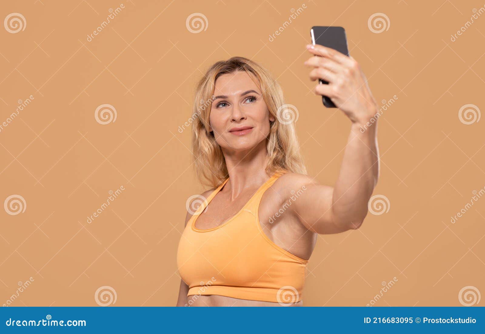 mature selfie hand bra