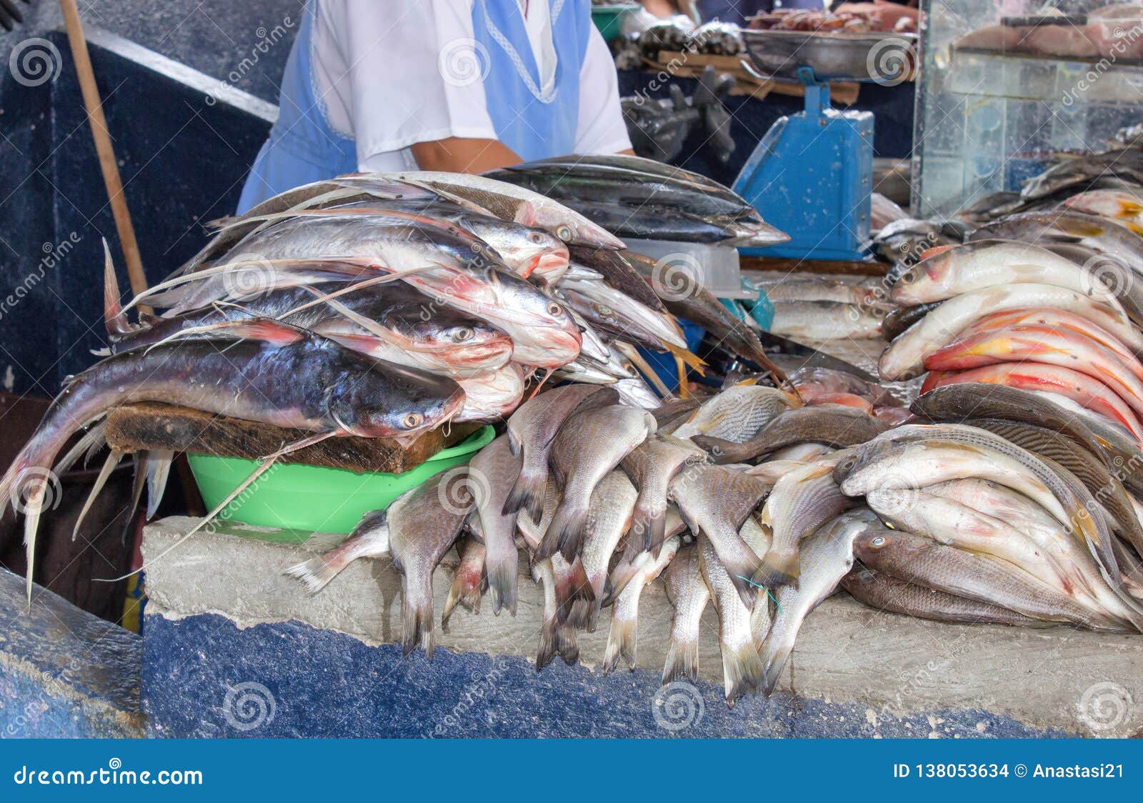 selling fish in the market. close-up. ecuador.