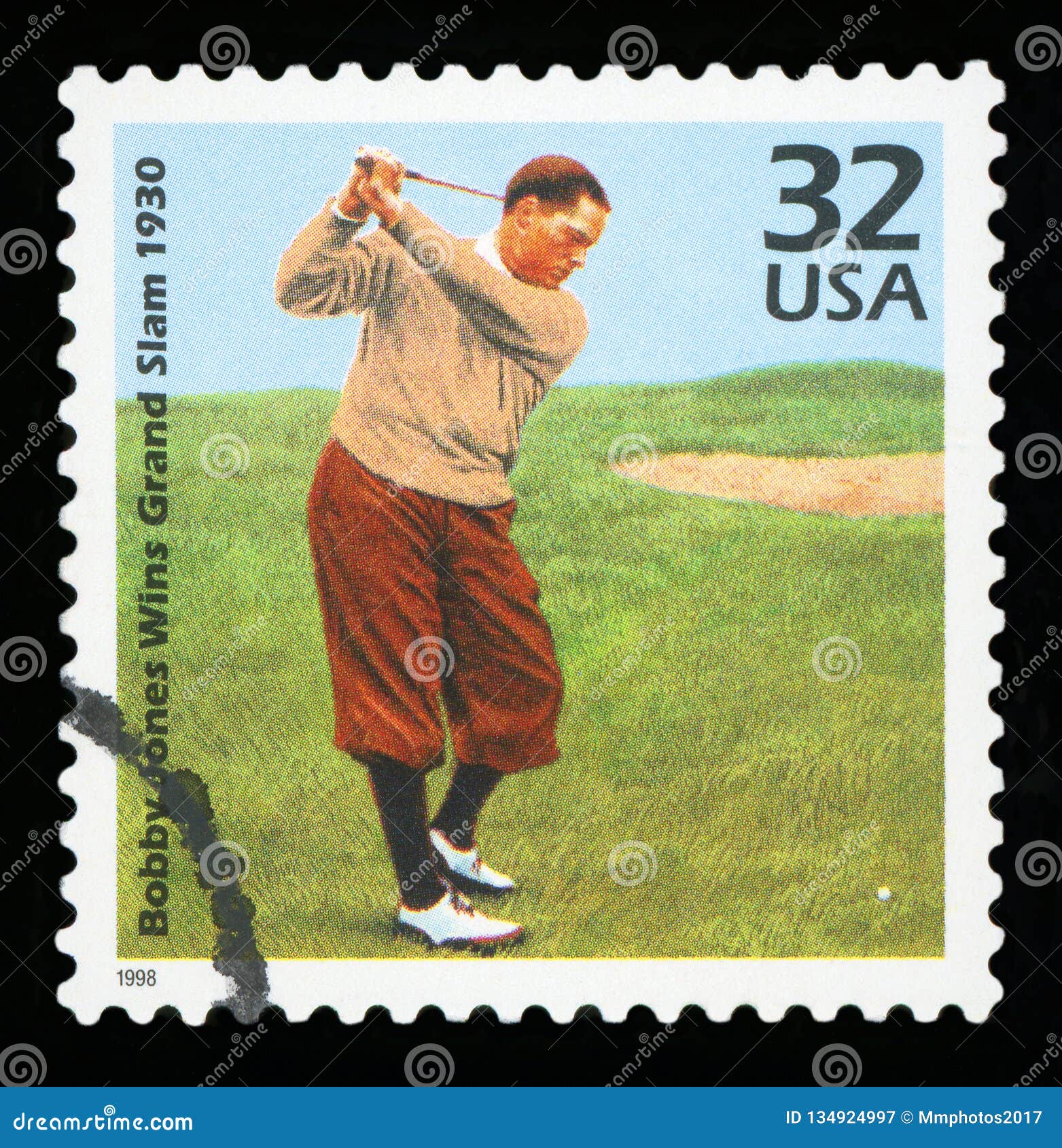 Selo postal dos E.U. ESTADOS UNIDOS DA AMÉRICA - CERCA DE 1998: Um selo impresso nos EUA que mostram uma imagem de Bobby Jones, grand slam 1930 das vitórias, cerca de 1998