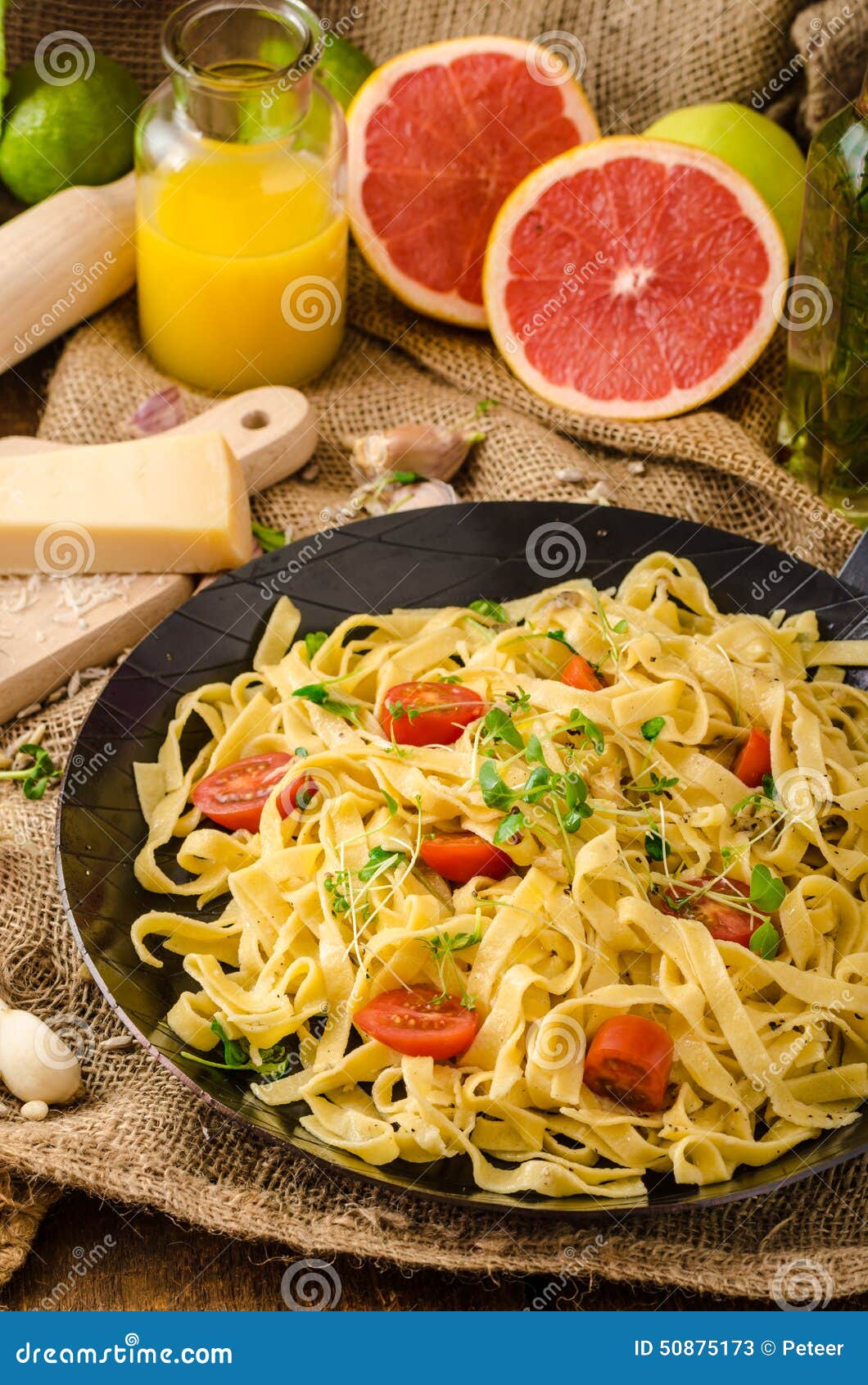 Semolina Pasta with Roasted Garlic, Sprinkled Microherbs Stock Image