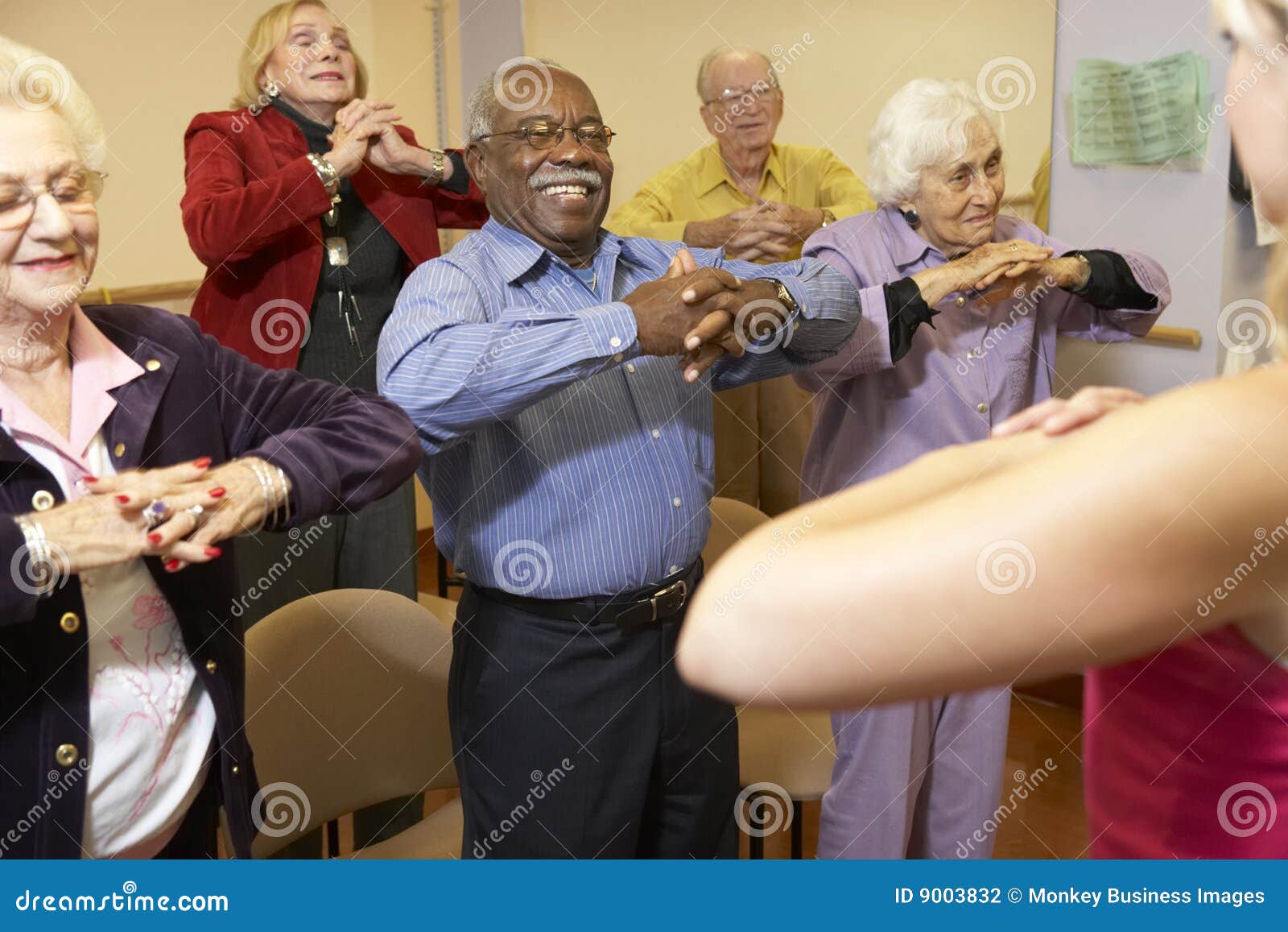 senior adults in a stretching class