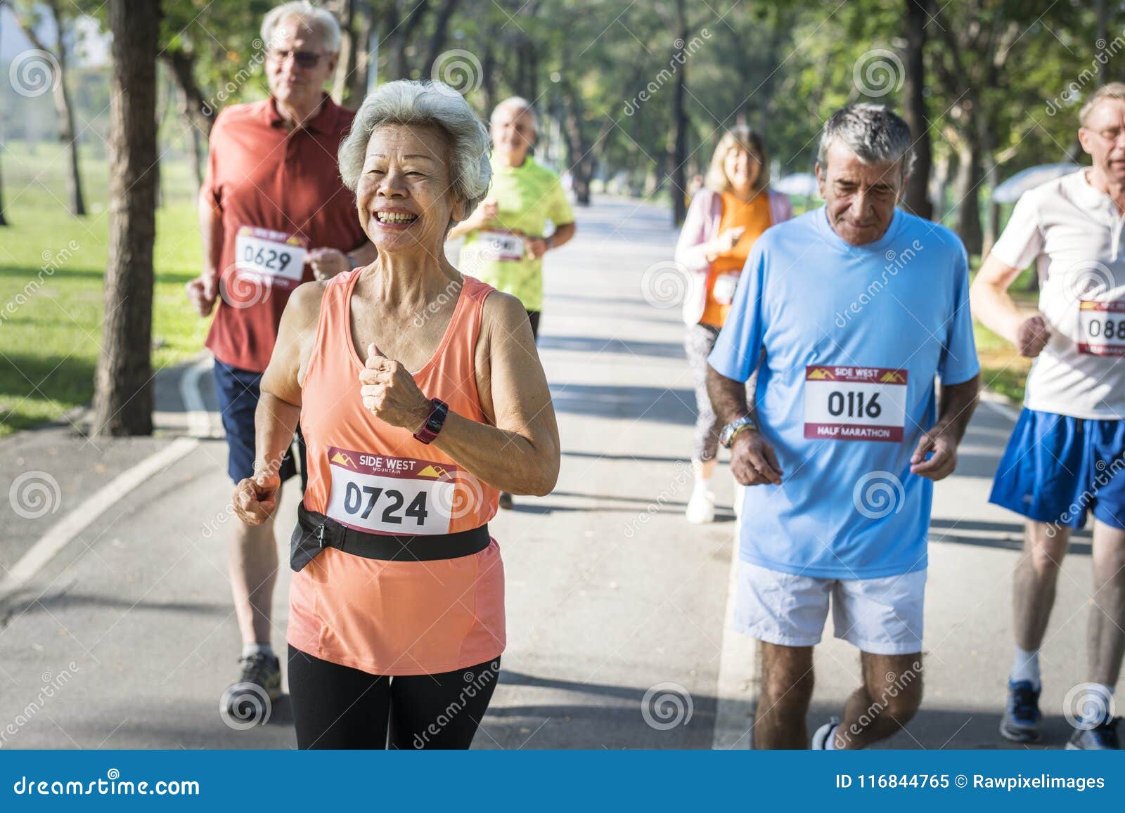 Senior Athletes Running Together in the Park Stock Image Image of