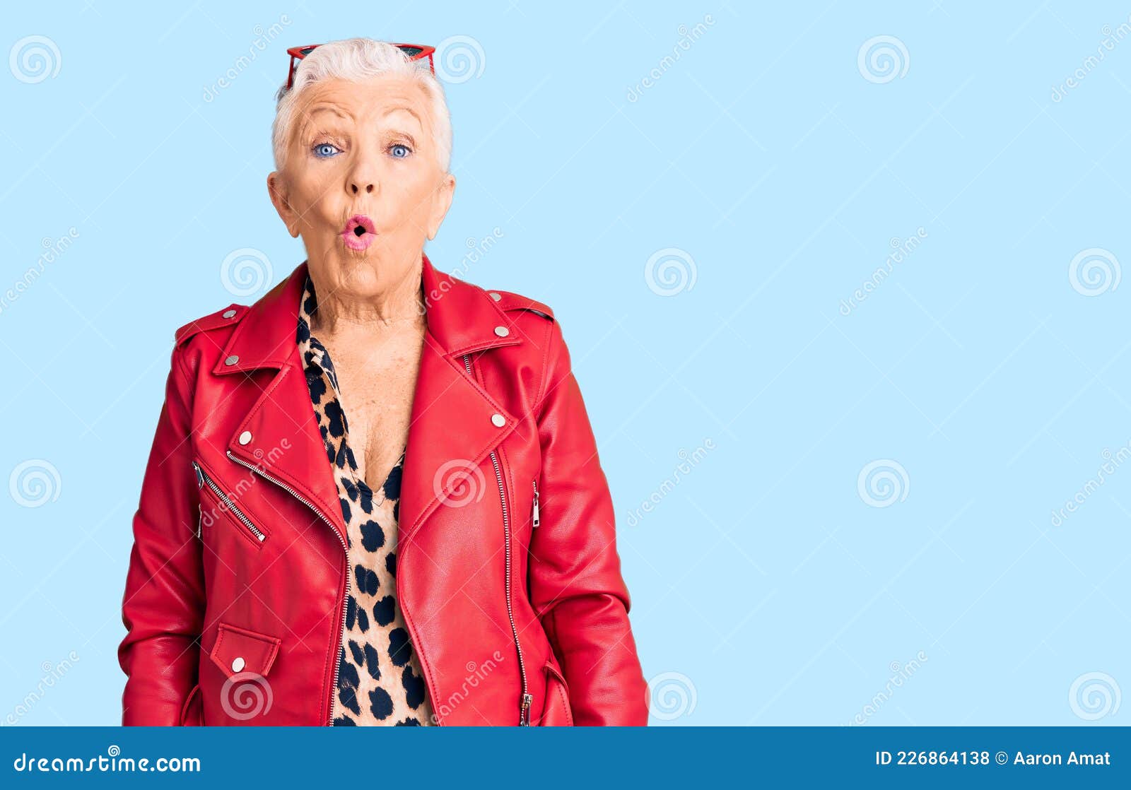 Senior Beautiful Woman with Blue Eyes and Grey Hair Wearing a Modern Style with a Red Leather Jacket Scared and Amazed with Open Stock Photo - Image of surprise, wonder: 226864138 Senior Beautiful Woman with Blue Eyes and Grey Hair Wearing a Modern Style with a Red Leather Jacket Scared and Amazed with Open Stock Photo - Image of surprise, wonder: 226864138