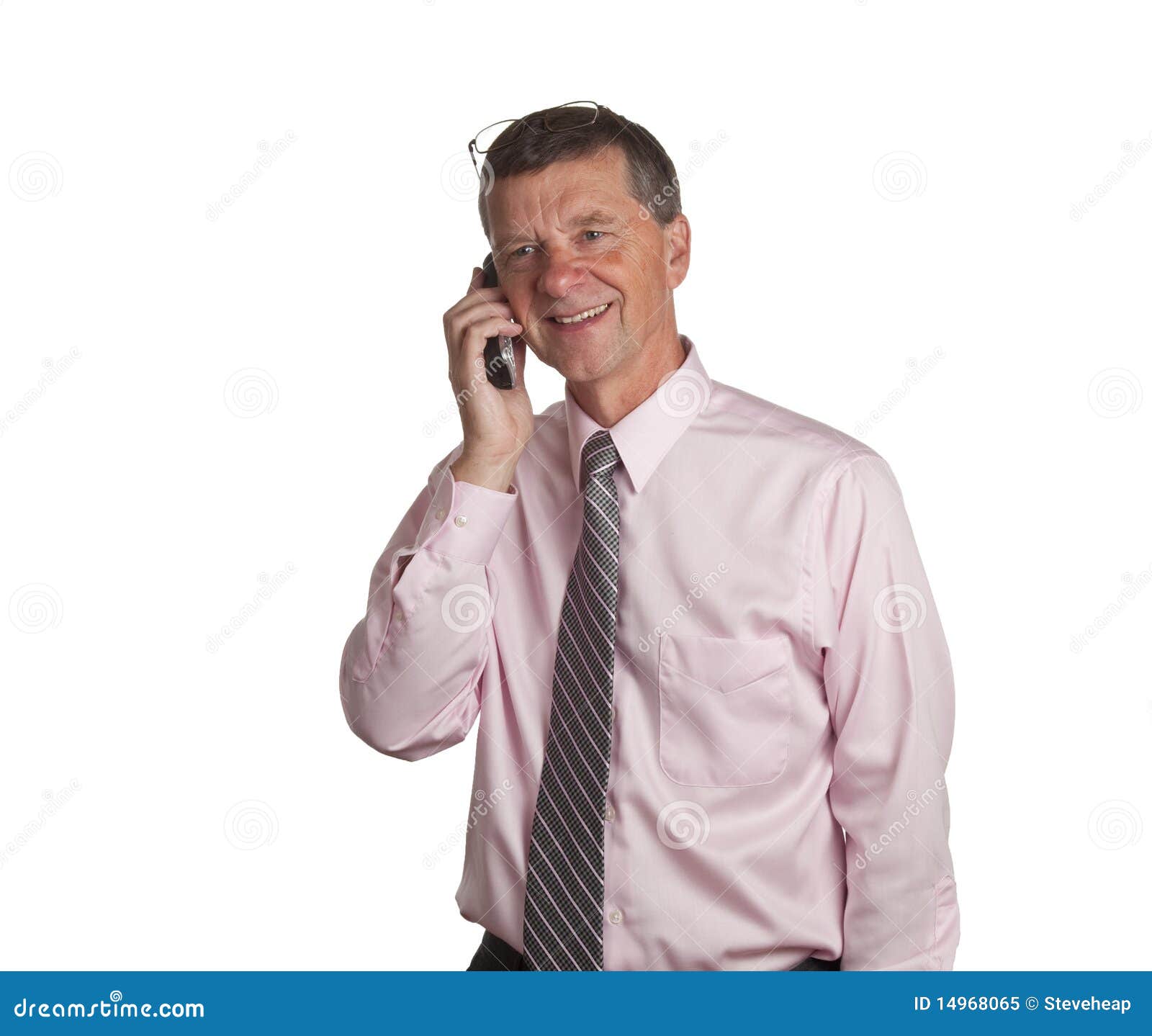 Senior with blackberry. Senior businessman making a telephone call on a blackberry type device