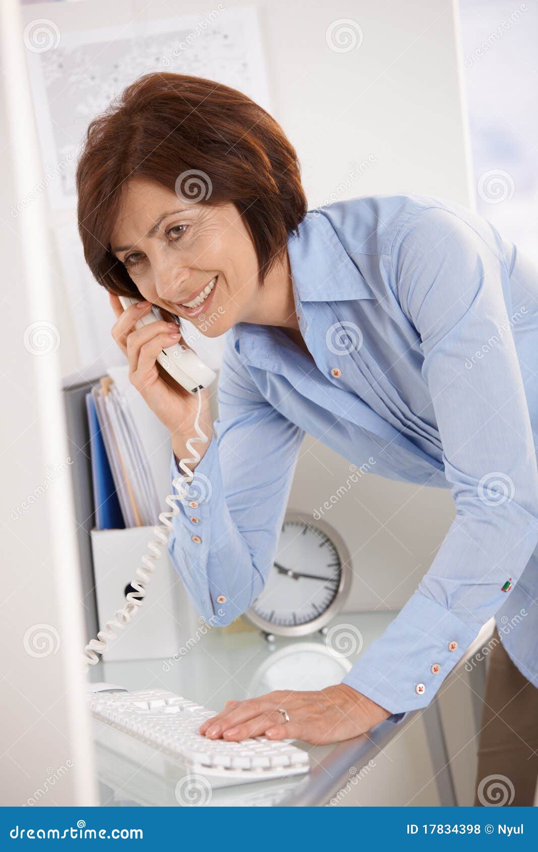 senior businesswoman on landline phone call