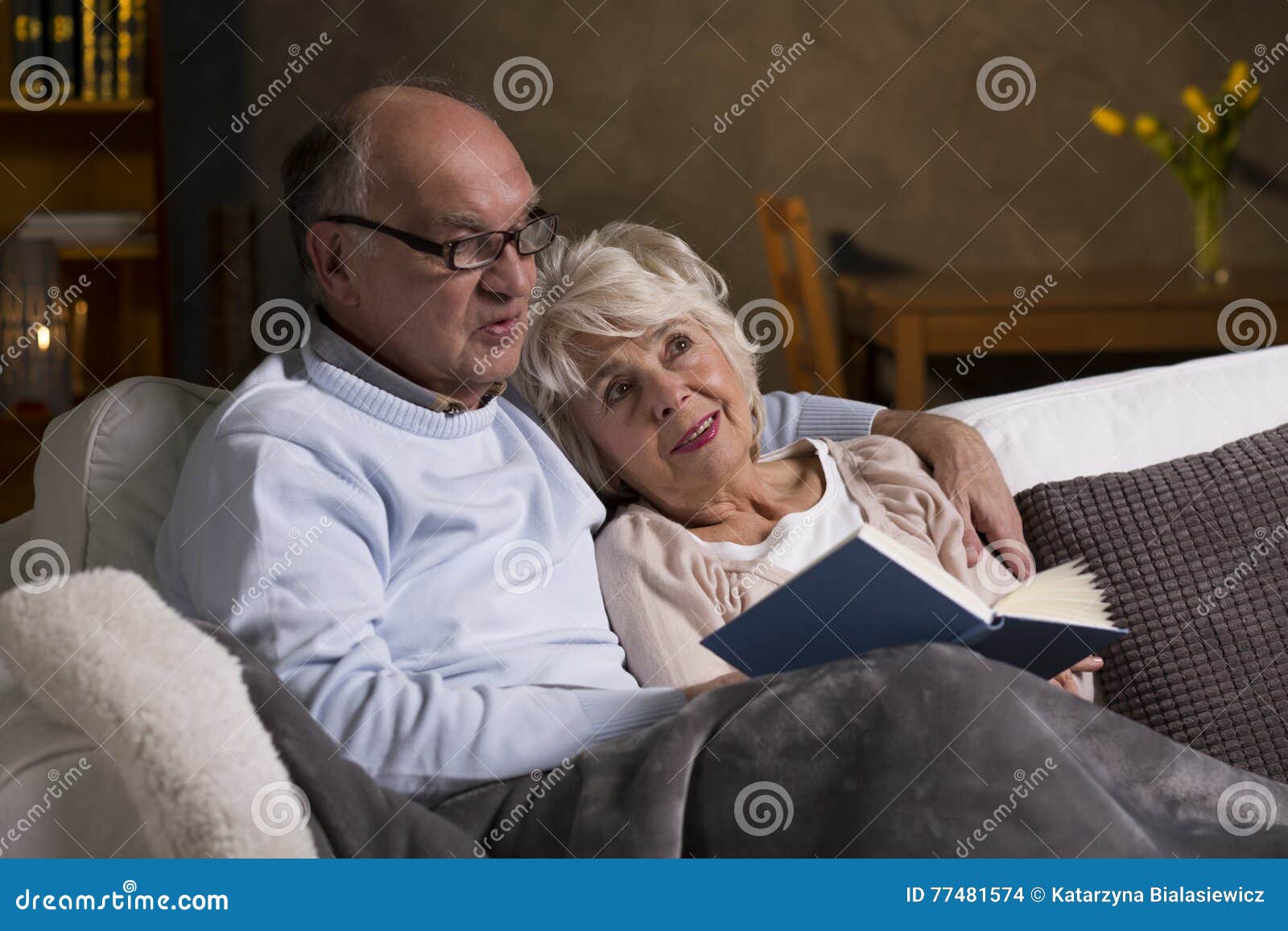 Senior Citizens on the Couch Stock Photo Image of table, affection