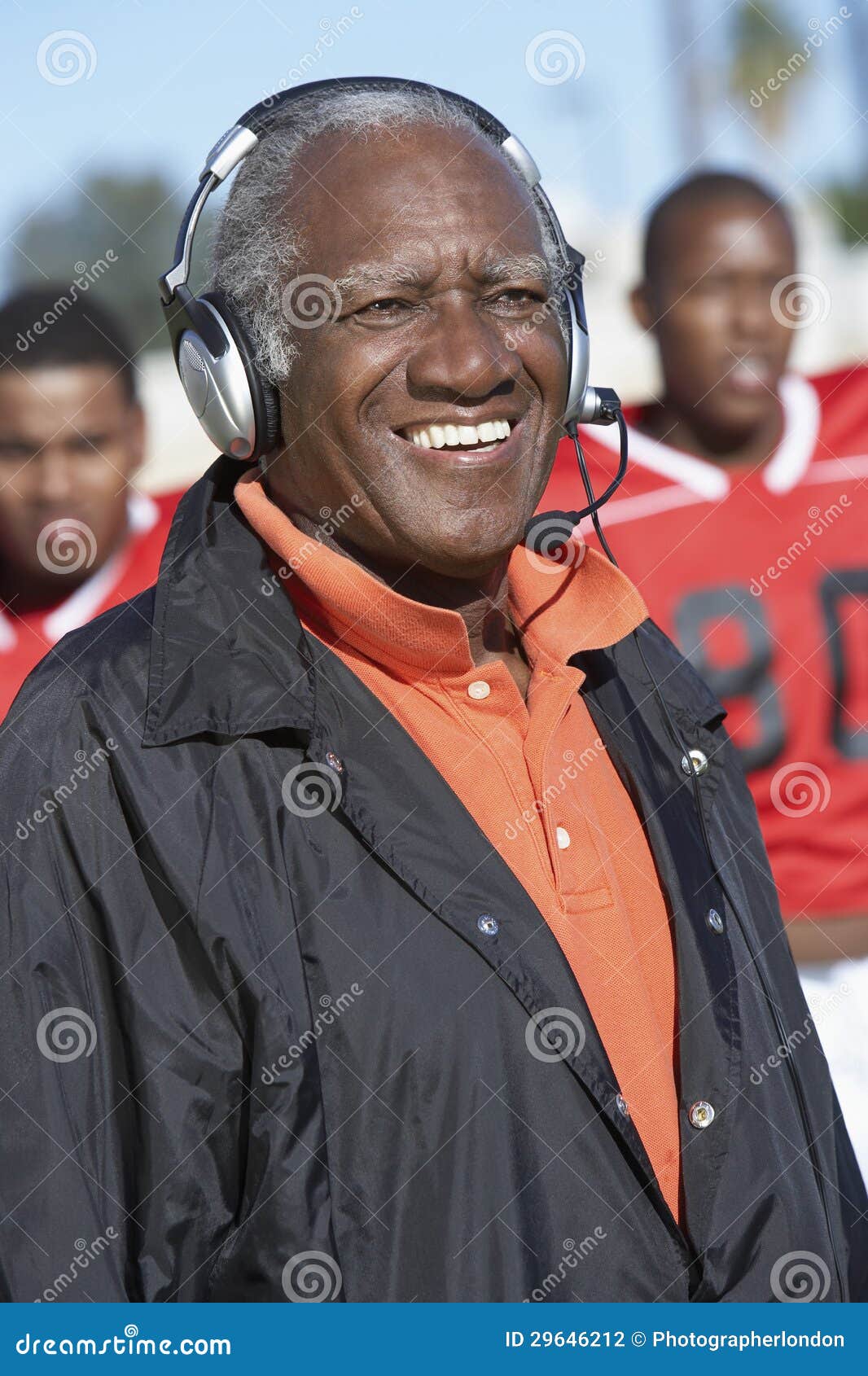 Senior Coach Wearing Headphones Stock Photo Image of coach
