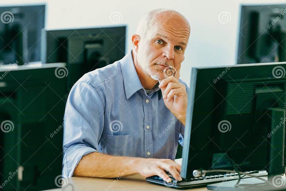 Senior at Computer in Contemporary Open Office Stock Image - Image of ...