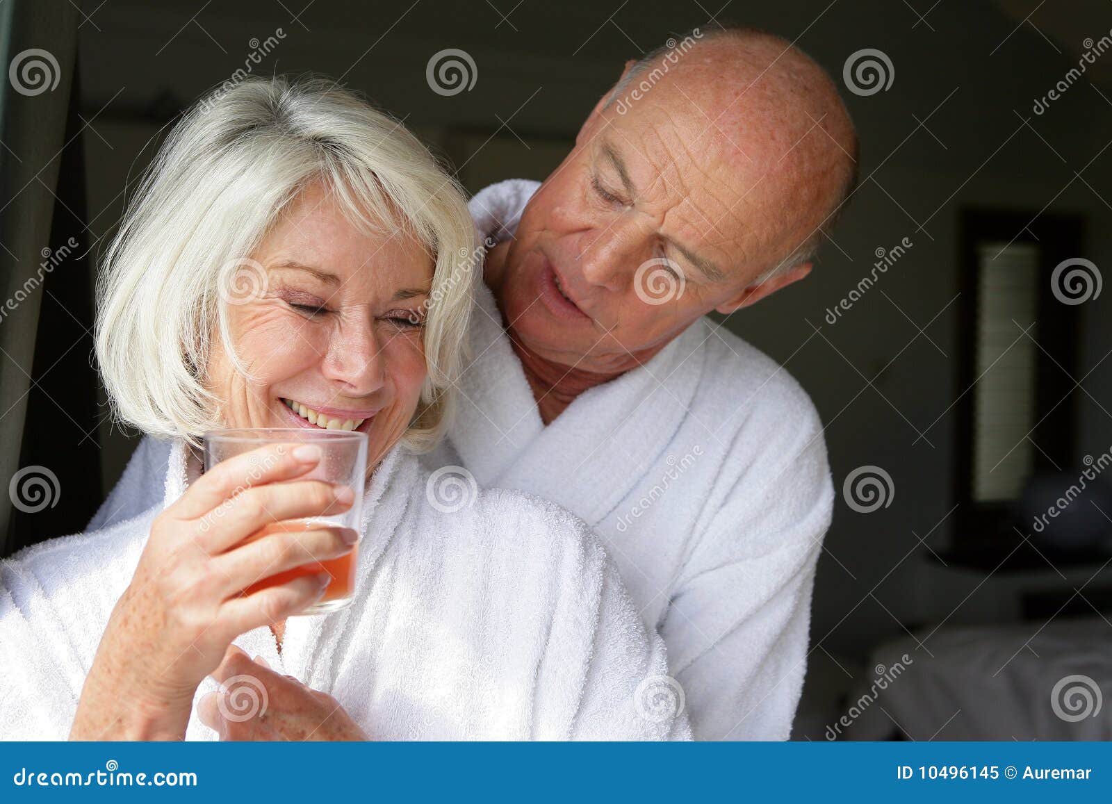 Senior couple in bathrobe stock image. Image of peace 10496145