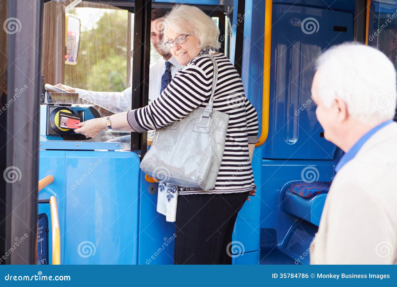 Senior Couple Boarding Bus and Using Pass Stock Photo Image of