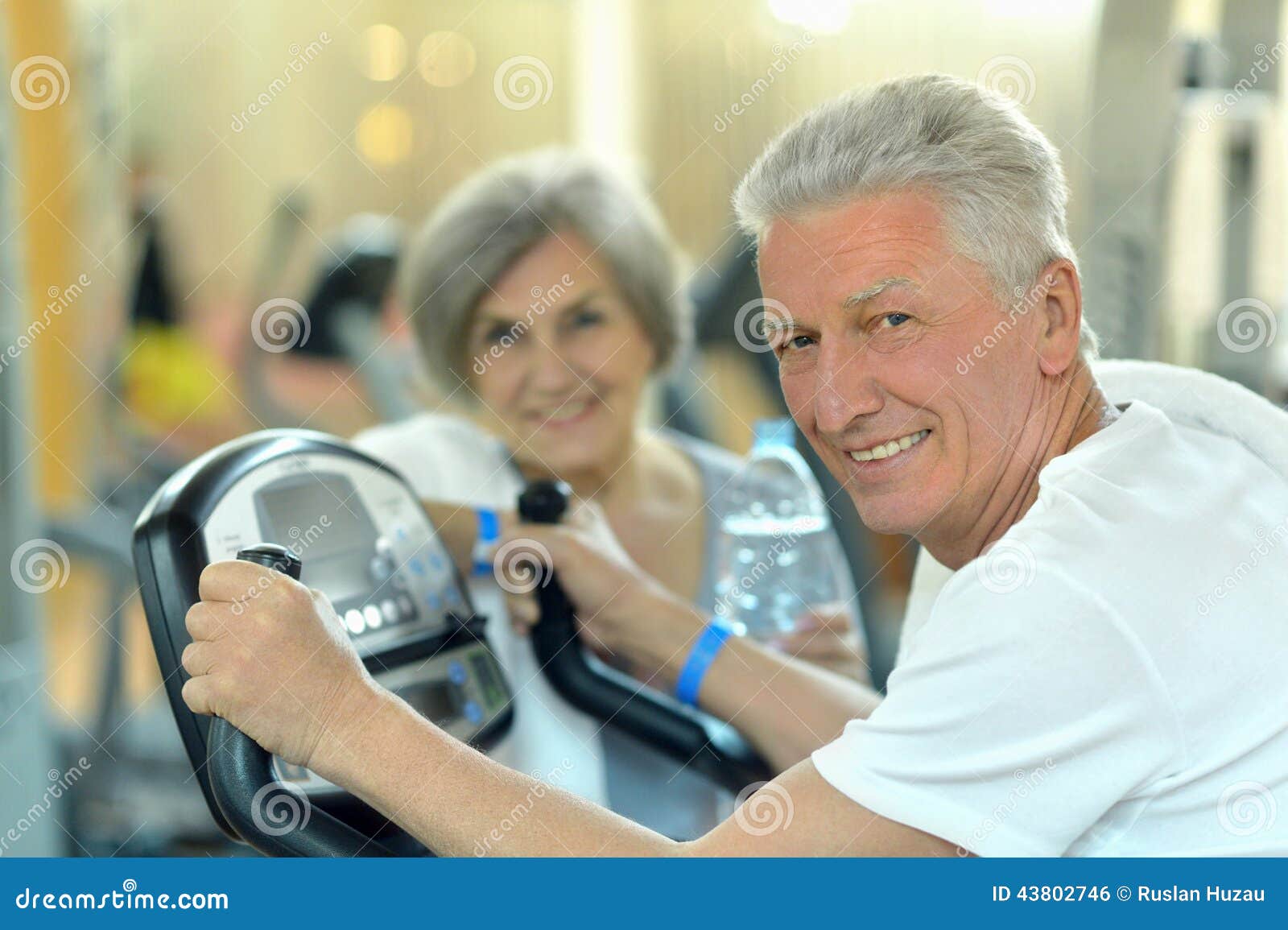 Senior Couple Exercising In Gym Stock Photo Image Of Medical Smiling