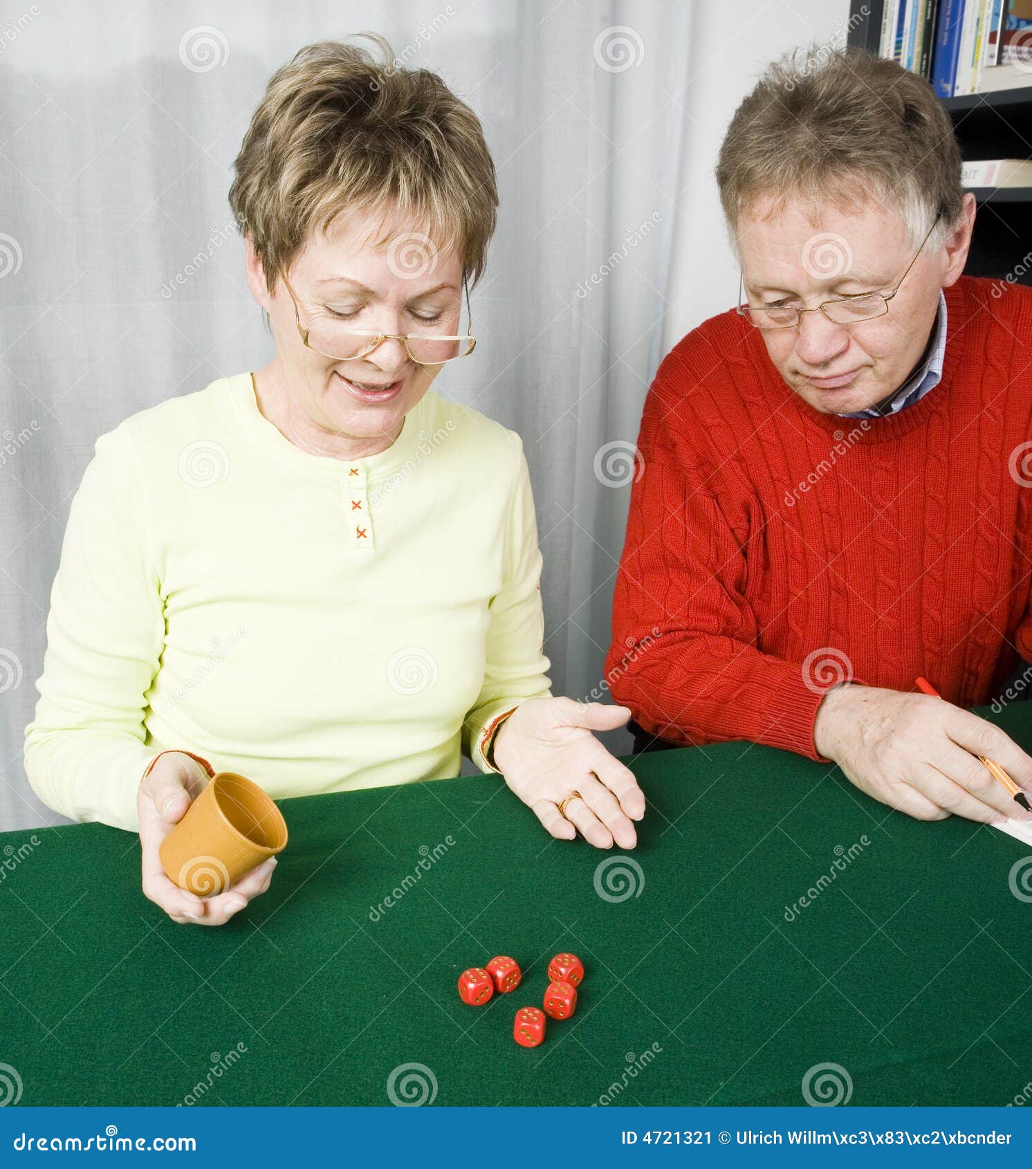 Senior couple playing dice stock image. Image of pair 4721321