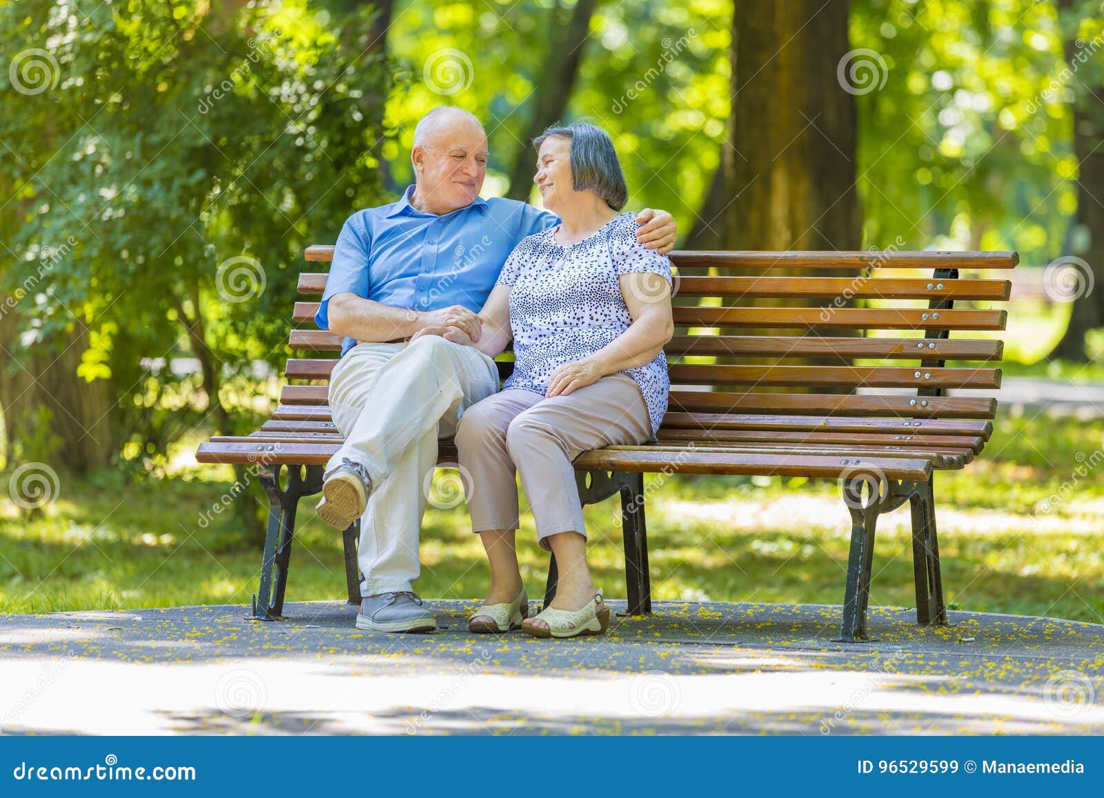 Senior Couple Relaxed Talking on the Park Bench Stock Image Image of
