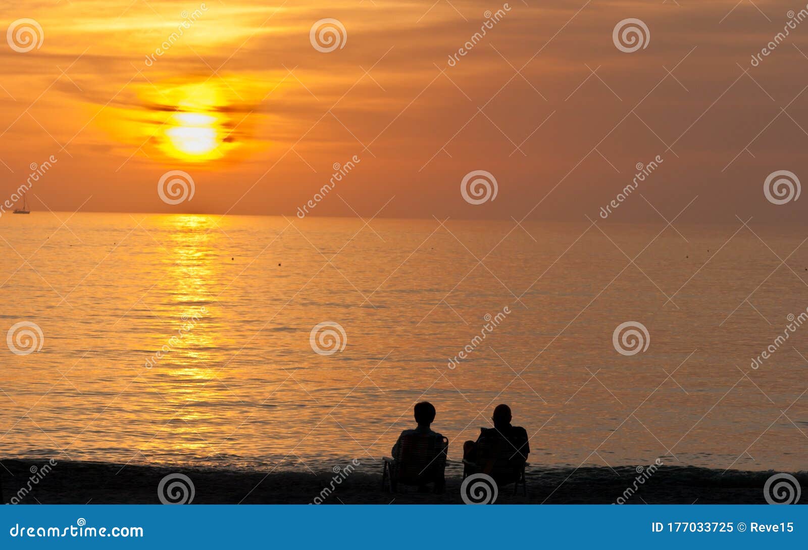 Senior Couple Sitting and Watching a Tropical Sunset Stock Image ...