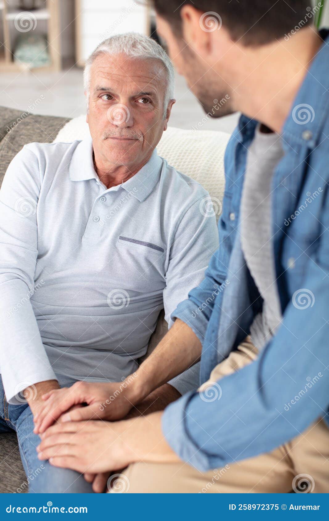 Senior Father Sits on Couch Taking To Song Stock Image Image of