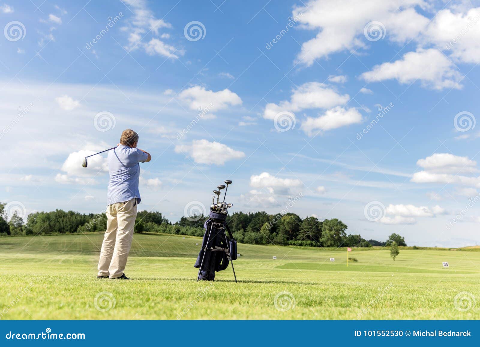 Senior Fit Man Hitting a Golf Ball. Stock Photo Image of nature, play