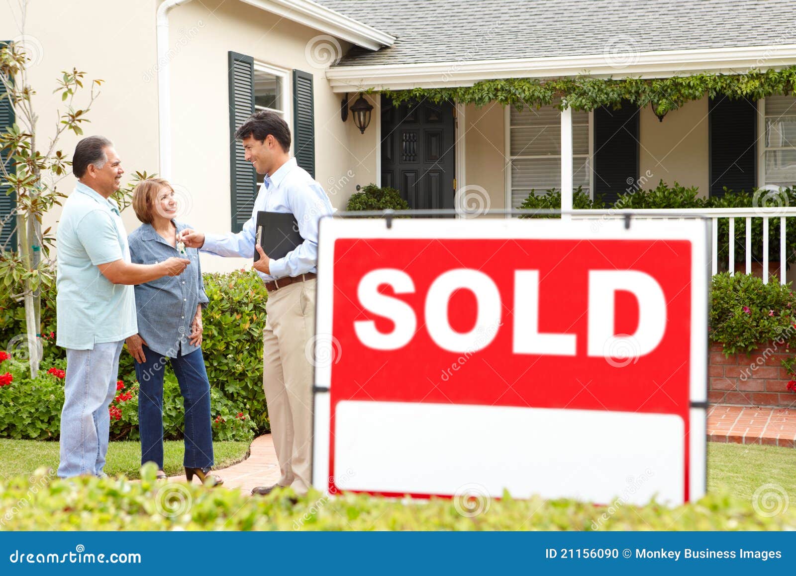 senior hispanic couple buying new home