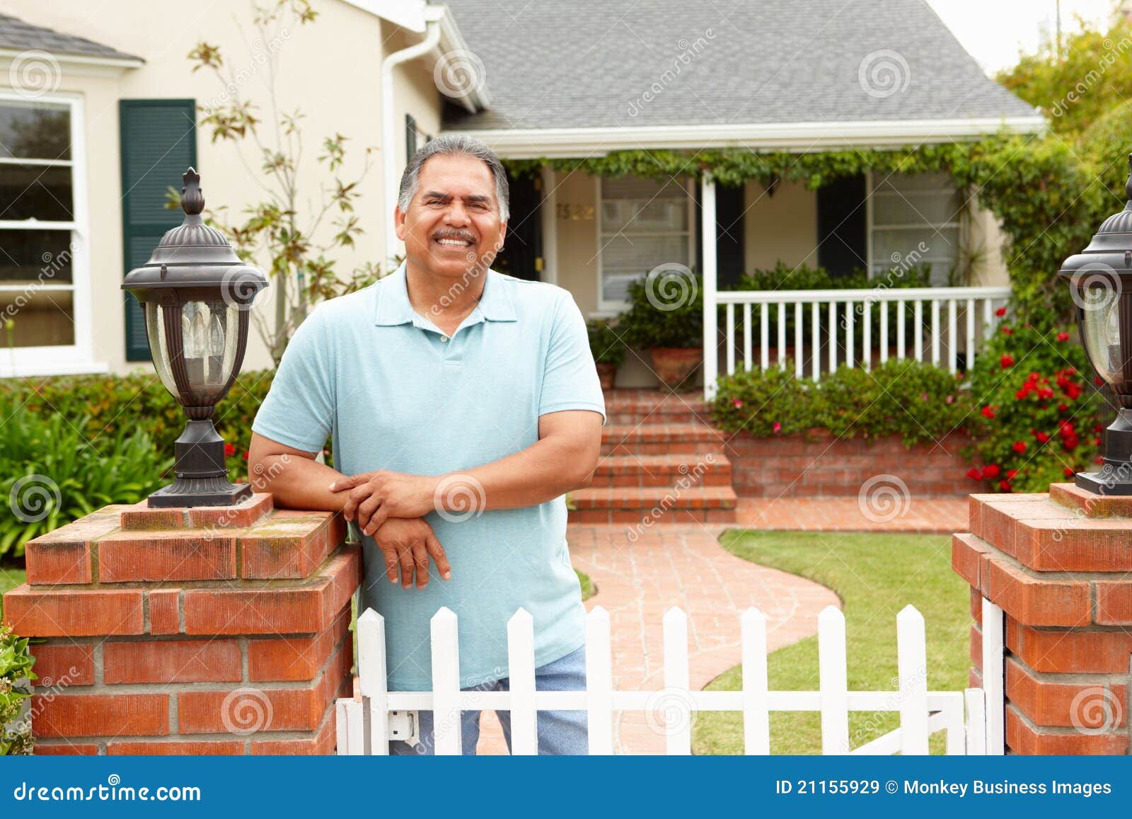 senior hispanic man outside home