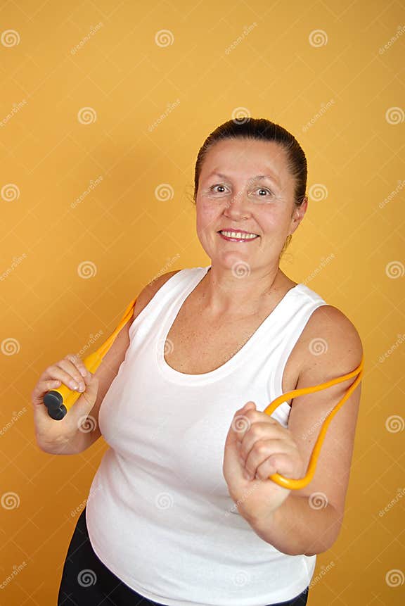 Senior with jumping rope stock photo. Image of detail 4376082