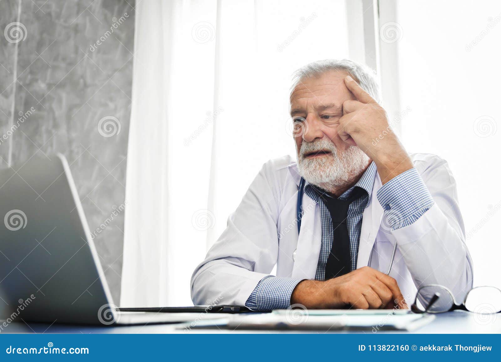 Senior Male Doctor is Thinking. Stock Photo - Image of adult, digital ...