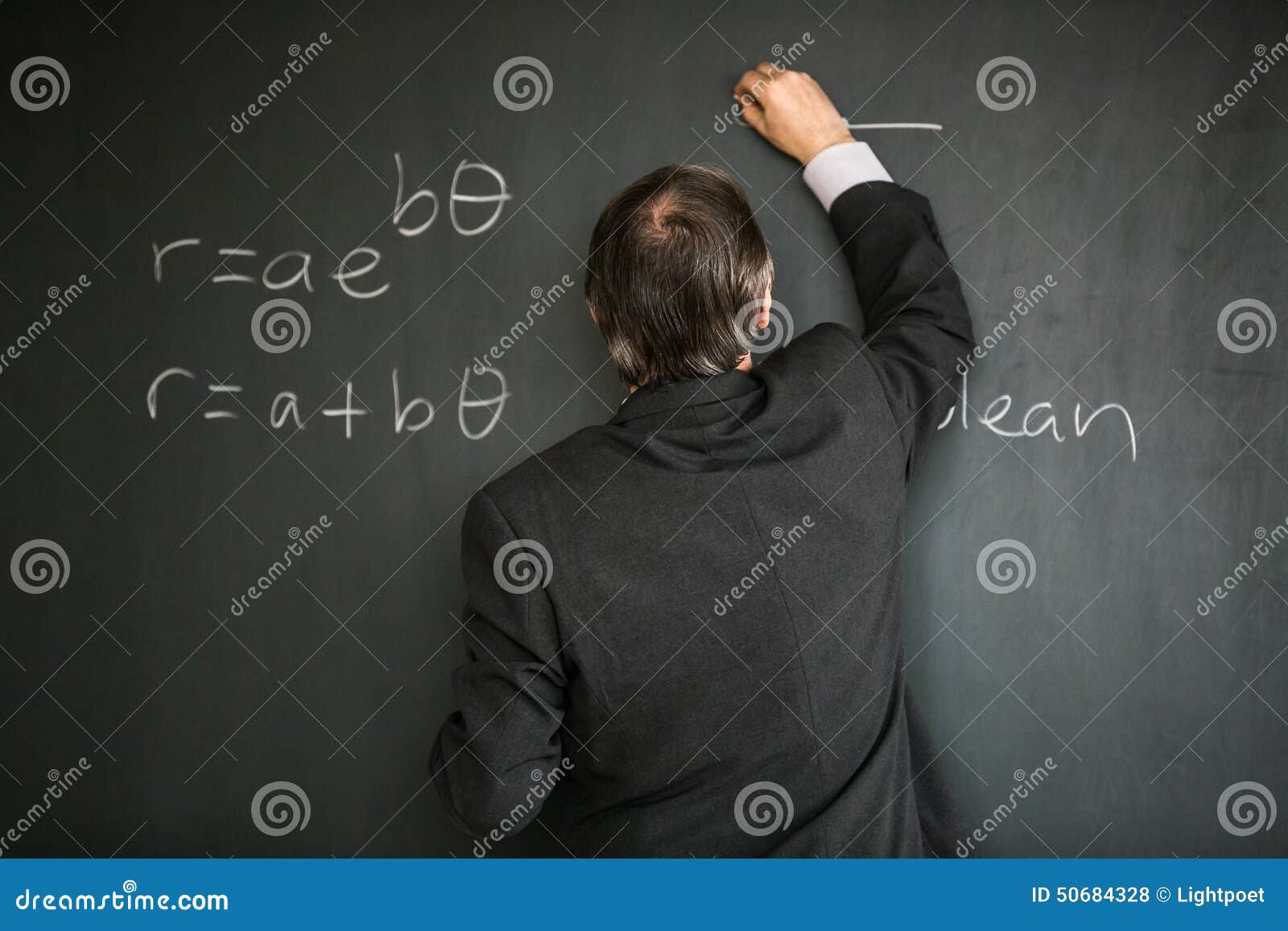senior male teacher teaching mathematics